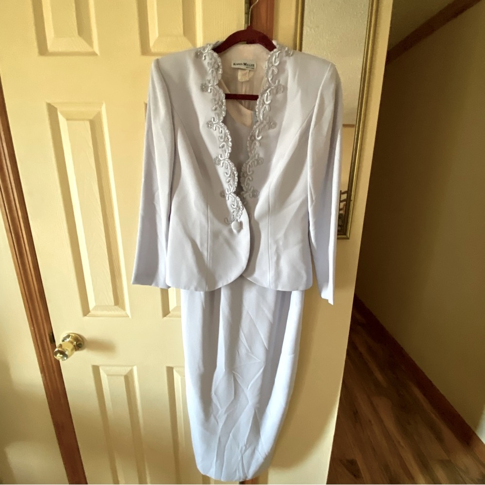 Karen Miller pale blue dress and jacket
